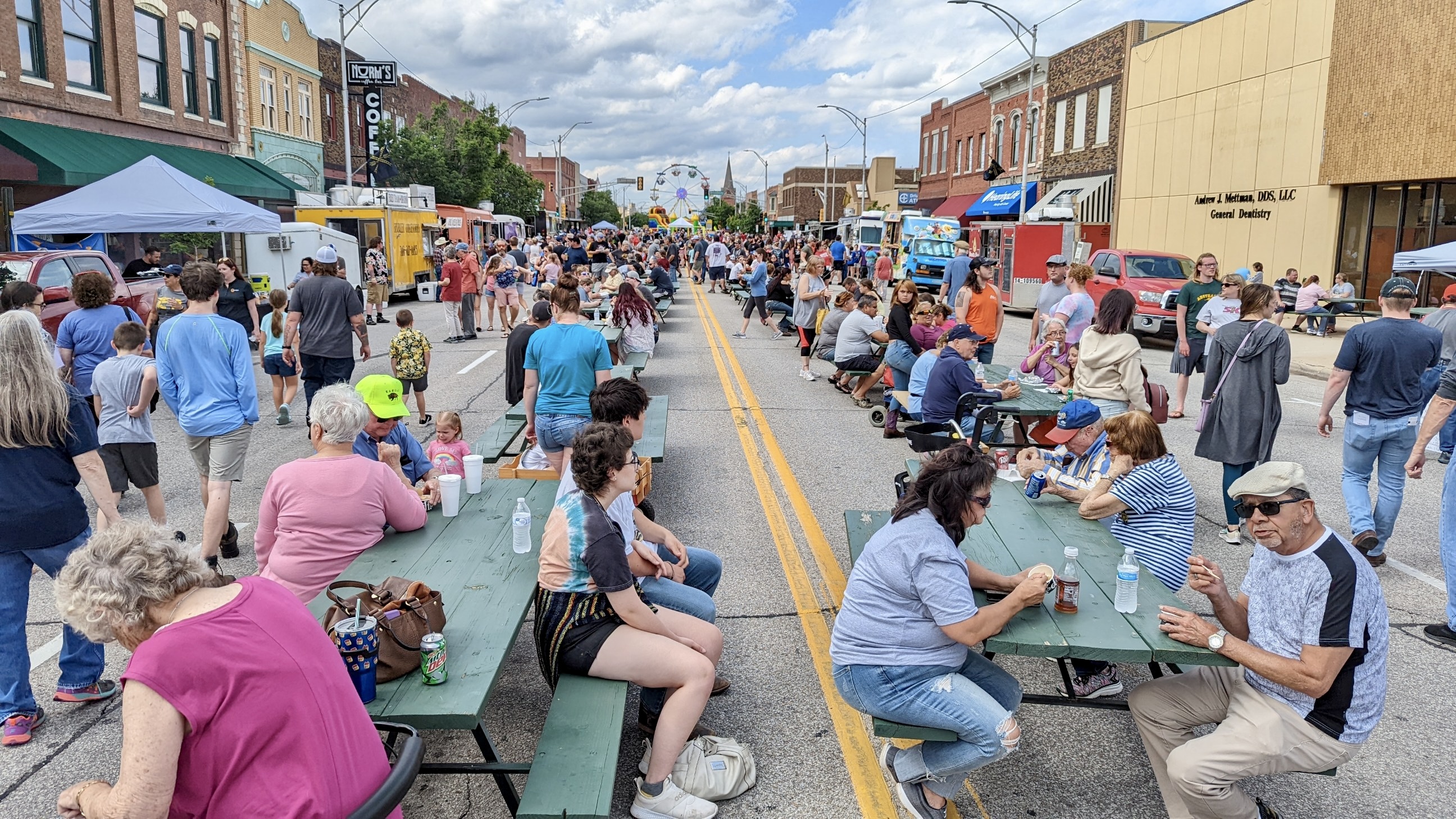 Crowds enjoy the food truck at the Summer Bash on Main Street